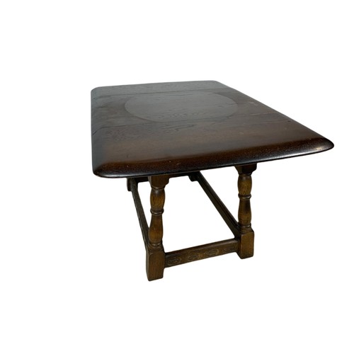 1104 - Small Old Charm revolving drop leaf table. Extended 69/52/41cm