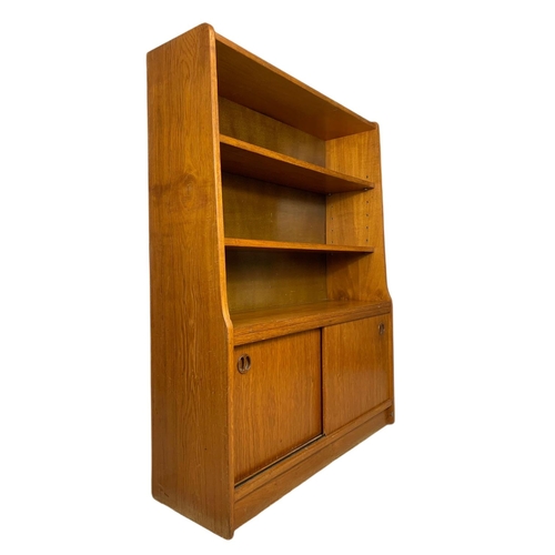 1049 - Danish teak mid century bookcase. 91/30/121cm