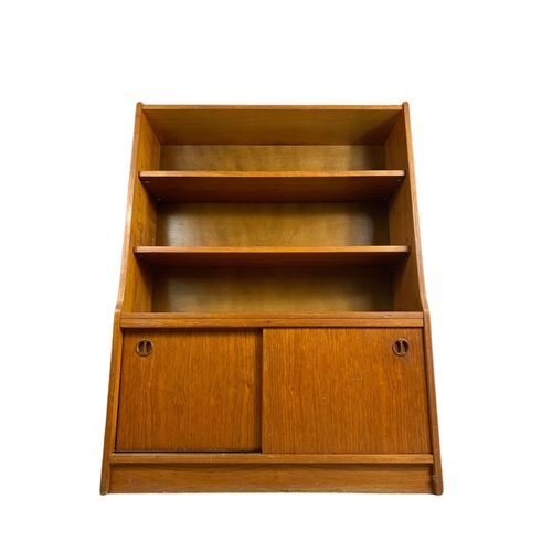 1049 - Danish teak mid century bookcase. 91/30/121cm