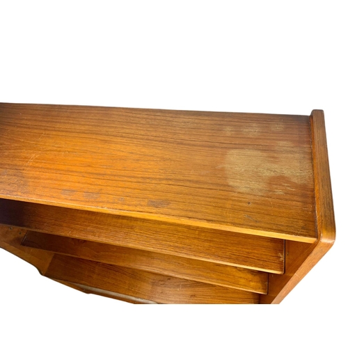 1049 - Danish teak mid century bookcase. 91/30/121cm