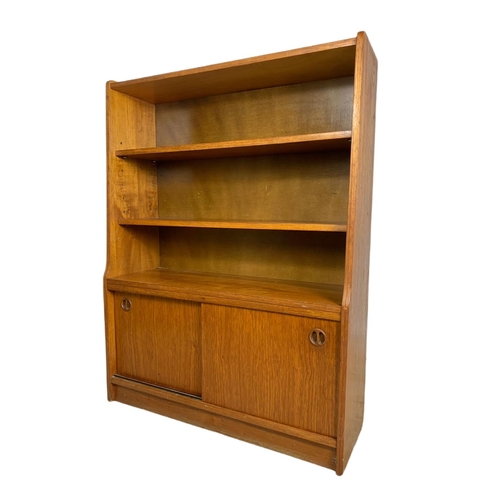 1049 - Danish teak mid century bookcase. 91/30/121cm