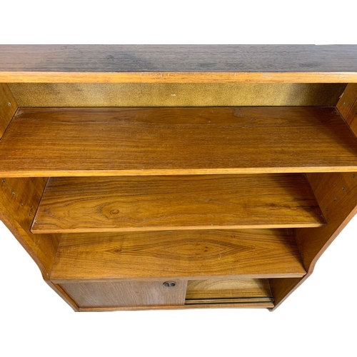 1049 - Danish teak mid century bookcase. 91/30/121cm