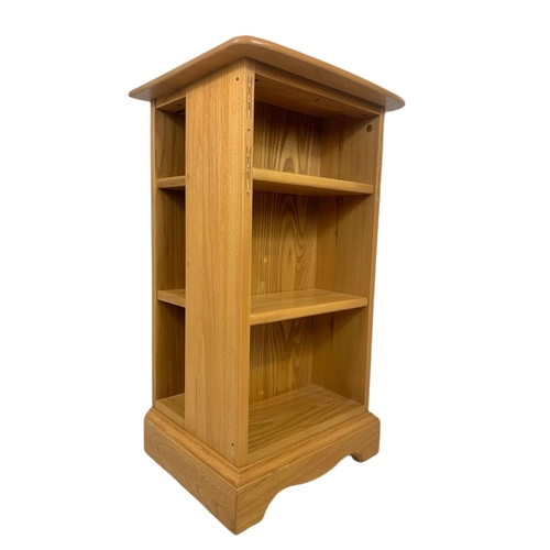 1067 - Blonde Ercol multi shelving unit. 43/38/76.5cm