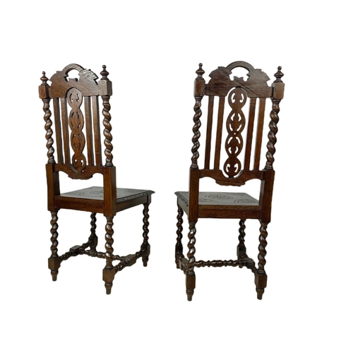 1071 - Pair of late 19th century carved oak side chairs, in the Jacobean style.