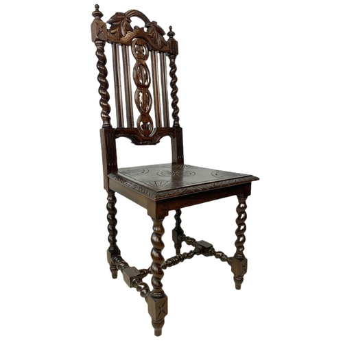 1071 - Pair of late 19th century carved oak side chairs, in the Jacobean style.