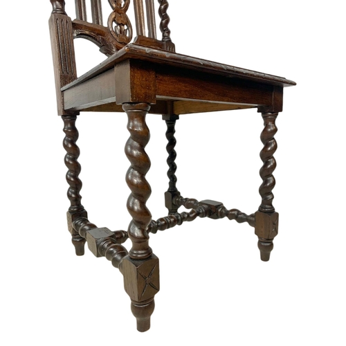 1071 - Pair of late 19th century carved oak side chairs, in the Jacobean style.