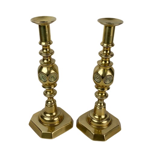 735 - Pair of Victorian brass candlesticks with 2 other brass ornaments.