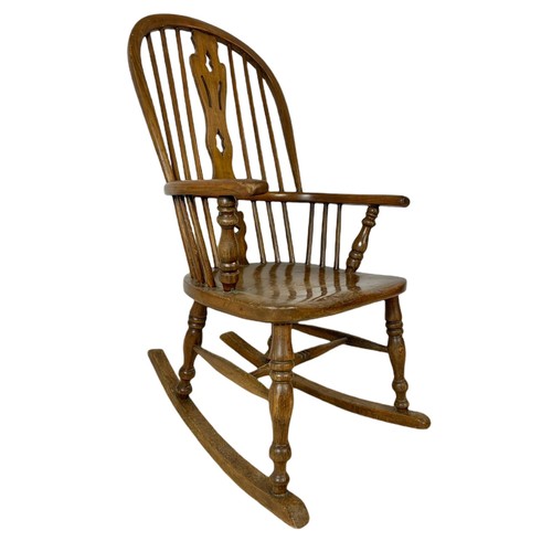 911 - Mid 19th century Windsor elm and beech rocking chair.