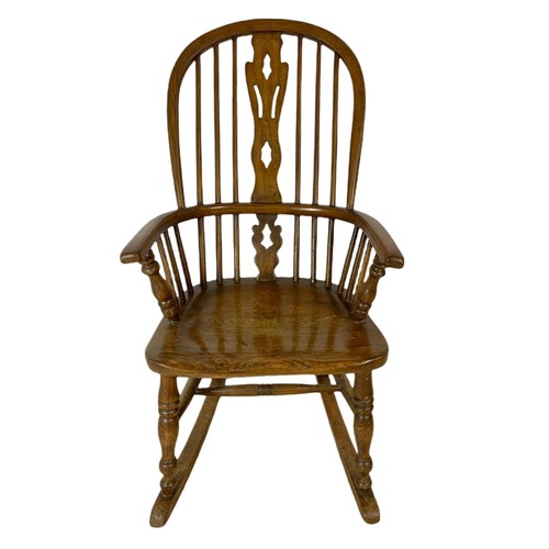 911 - Mid 19th century Windsor elm and beech rocking chair.