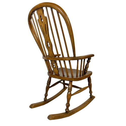 911 - Mid 19th century Windsor elm and beech rocking chair.