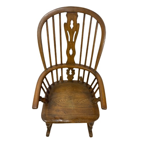 911 - Mid 19th century Windsor elm and beech rocking chair.