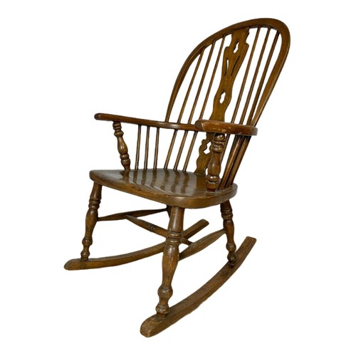 911 - Mid 19th century Windsor elm and beech rocking chair.