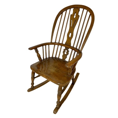 911 - Mid 19th century Windsor elm and beech rocking chair.