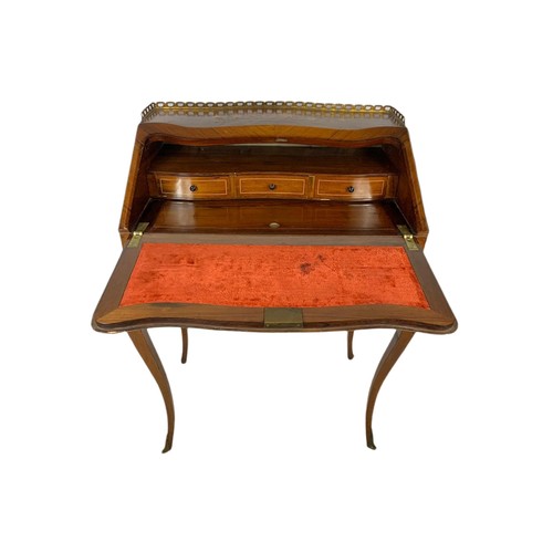 915 - Late 19th century marquetry inlaid rosewood French bureau with brass gallery and ormolu mounts. 71/4... 