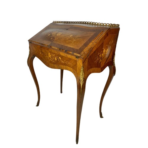 915 - Late 19th century marquetry inlaid rosewood French bureau with brass gallery and ormolu mounts. 71/4... 