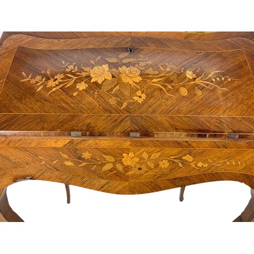 915 - Late 19th century marquetry inlaid rosewood French bureau with brass gallery and ormolu mounts. 71/4... 