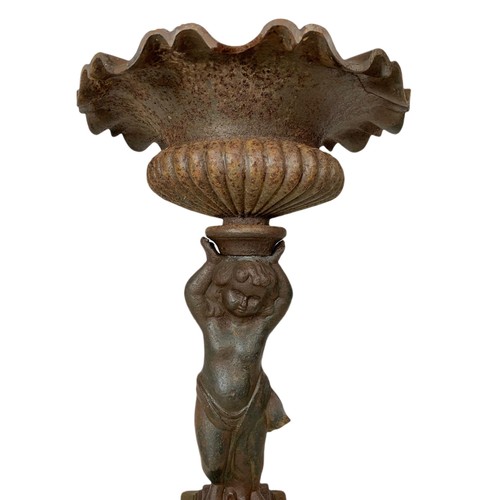 710 - Pair of of late 19th century cast iron garden urns. 63cm