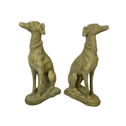 709 - Pair of large constituted stone garden dogs. 79cm