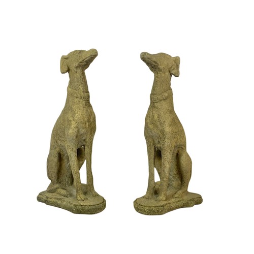 709 - Pair of large constituted stone garden dogs. 79cm