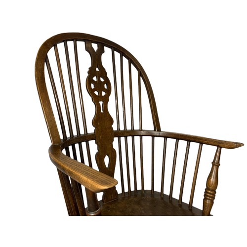 912 - Large mid 19th century elm and beech Windsor armchair