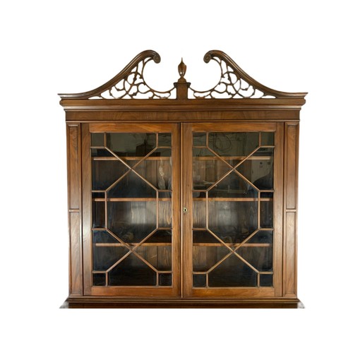 918 - Large Victorian secretaire bookcase in the Georgian style. With swan neck open fret 126/57/231cm