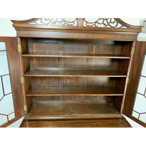 918 - Large Victorian secretaire bookcase in the Georgian style. With swan neck open fret 126/57/231cm