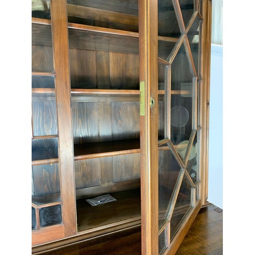 918 - Large Victorian secretaire bookcase in the Georgian style. With swan neck open fret 126/57/231cm