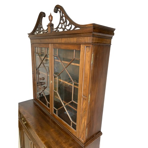 918 - Large Victorian secretaire bookcase in the Georgian style. With swan neck open fret 126/57/231cm