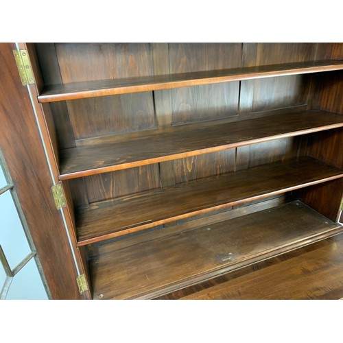 918 - Large Victorian secretaire bookcase in the Georgian style. With swan neck open fret 126/57/231cm