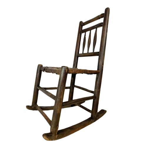 973 - Small mid 19th century country rocking chair in the Lancashire style with original leather seat. 46/... 