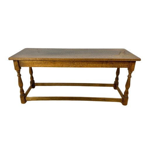 1097 - Long oak coffee table and a mahogany magazine table. Coffee table 108cm