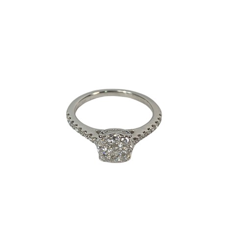 801H - 14ct white gold ladies ring. Cluster of round brilliant cut diamonds. With diamond claw set shoulder... 