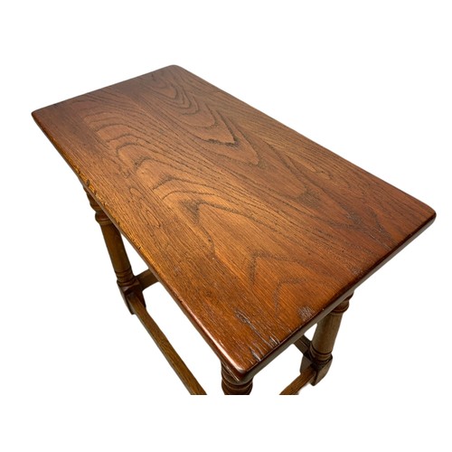 1074 - Reproduction oak cricket table, joint stool and an oak occasional table 61/61/71cm