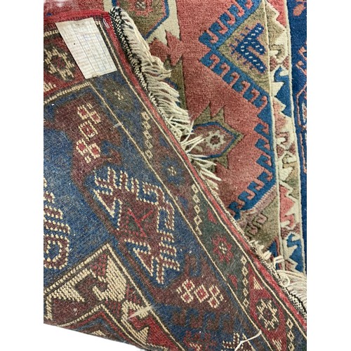 1054 - Vintage Middle Eastern hand sewn rug. 122/204cm