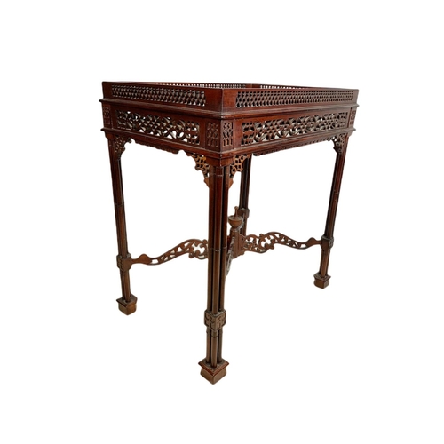 1086 - Carved mahogany silver table in the mid 18th century Chippendale style. 62/42/67cm