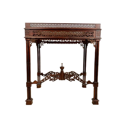 1086 - Carved mahogany silver table in the mid 18th century Chippendale style. 62/42/67cm