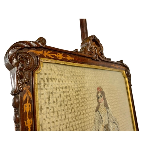 1093 - George IV inlaid rosewood screen with wool work panel. Circa 1825. 140cm