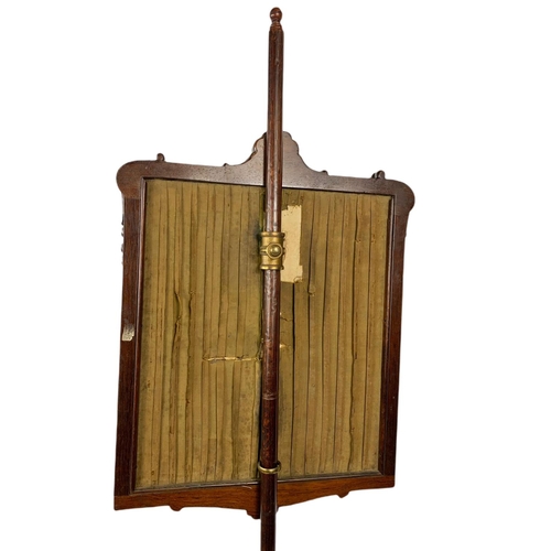 1093 - George IV inlaid rosewood screen with wool work panel. Circa 1825. 140cm