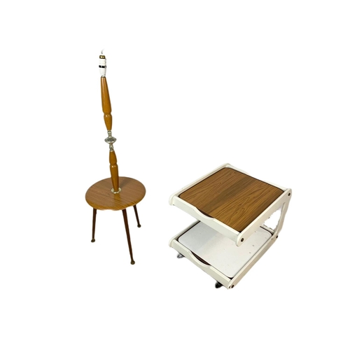 1096 - Mid century standard lamp and a 2 tier side table on wheels.