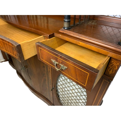 1107 - Large Georgian style inlaid mahogany serpentine sideboard. 149/40/142cm