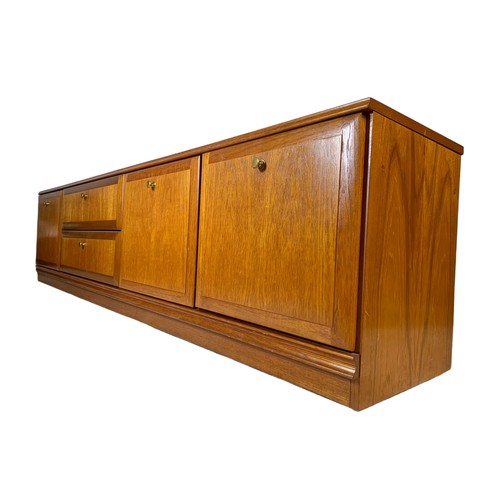 1035b - Meredew teak mid century lowboard. 101/38/49cm.