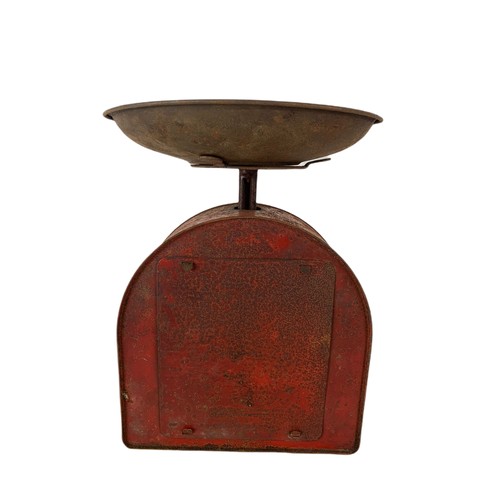 2 - Early 20th century tin weighing scales. 21x28.5cm