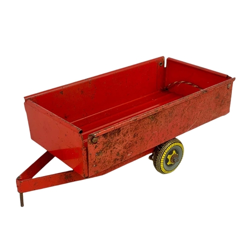 76c - Mettoy tin plate tipping trailer and another vintage tin plate trailer. 25.5cm