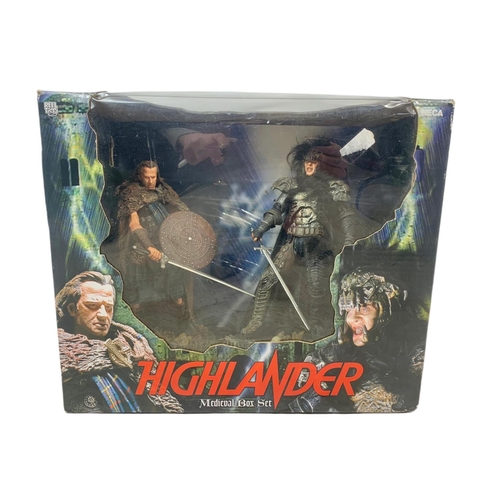 111 - MECA Highlander Medieval Box Set. The Kurgan and MacLeod. Figures measure 22cm. Box measures 28x25cm