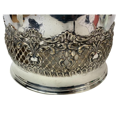 12 - Late 19th century ornate silver plated planter. 27/17cm.