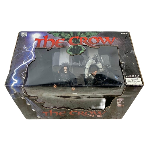 122 - Neca Reel Toys “The Crow” Eric Draven and Top Dollar. Box measures 30.5x18x21cm