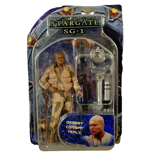 152 - Stargate SG.1 action figures in boxes. “Teal’c, Desert Combat Teal’c, Jaffa Warrior Teal’c Previews ... 