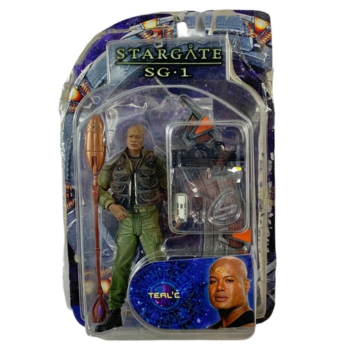 152 - Stargate SG.1 action figures in boxes. “Teal’c, Desert Combat Teal’c, Jaffa Warrior Teal’c Previews ... 