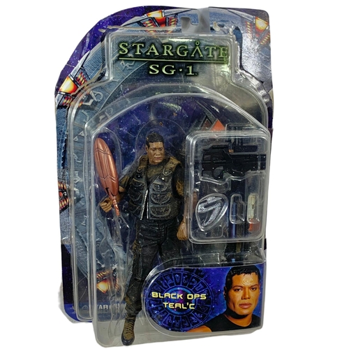 152 - Stargate SG.1 action figures in boxes. “Teal’c, Desert Combat Teal’c, Jaffa Warrior Teal’c Previews ... 