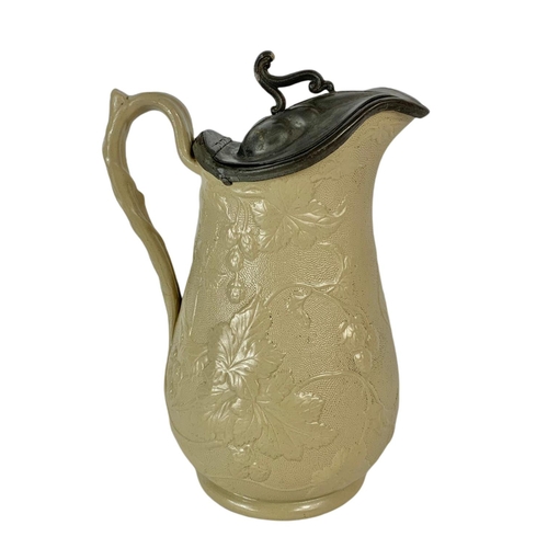 16 - 19th century pottery jug with pewter top. 24cm